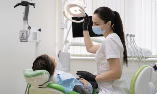 dentist and patient in a treatment room