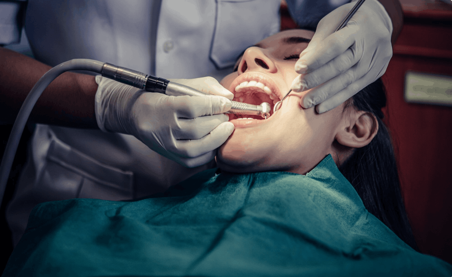 patient going through tooth scaling procedure