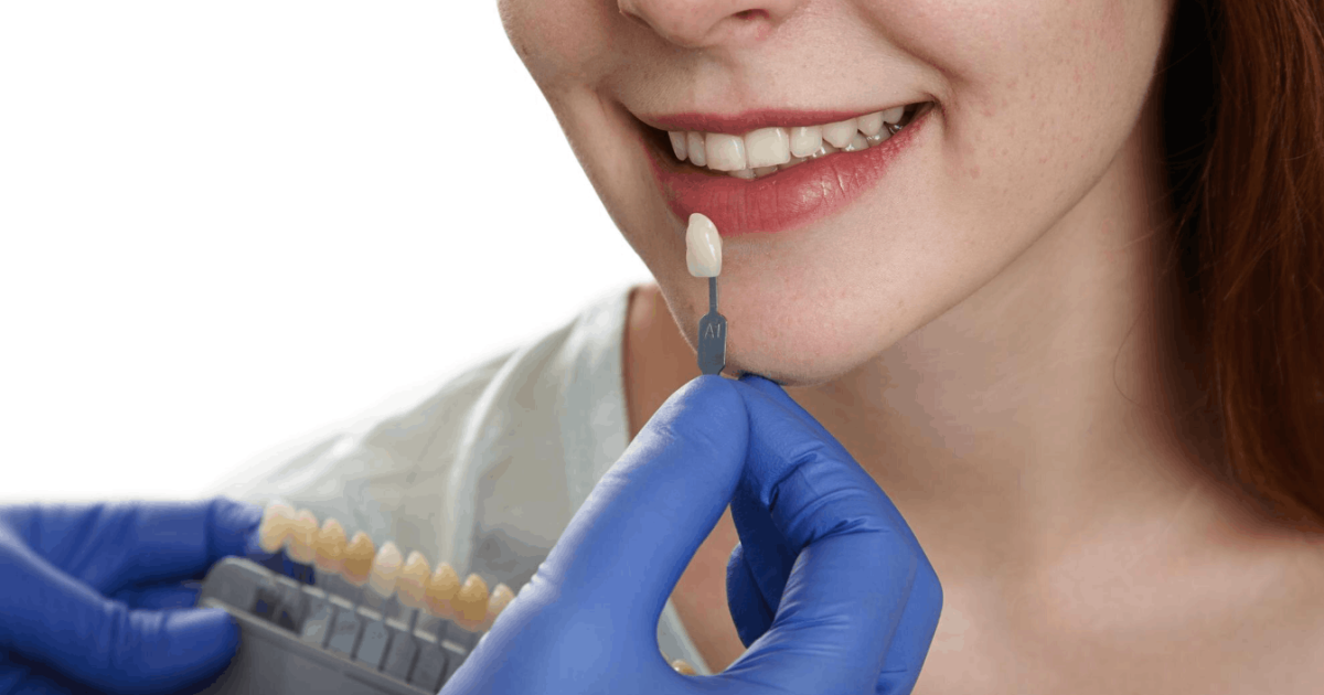 woman trying on different tooth crowns
