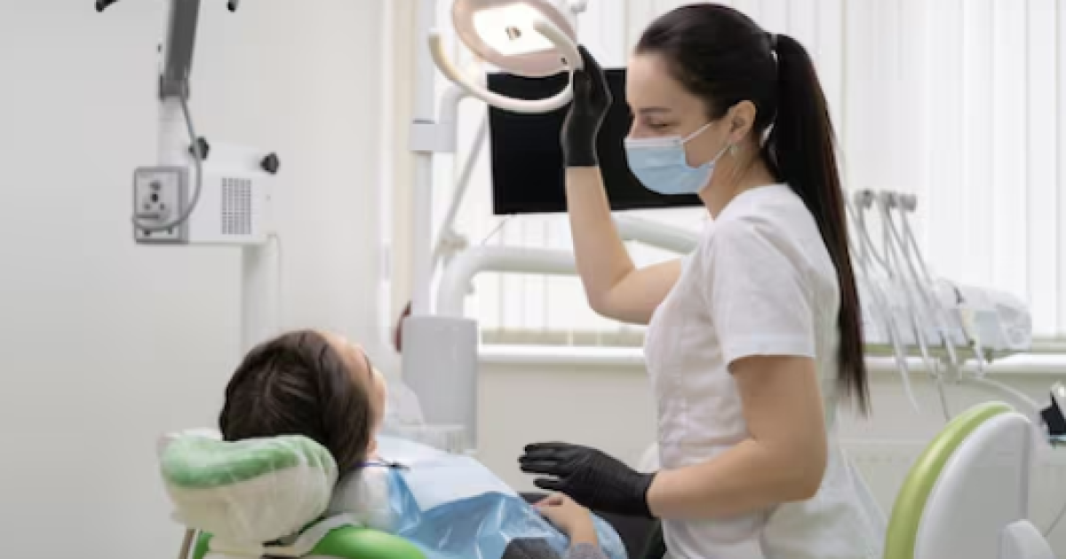 dentist and patient in a treatment room